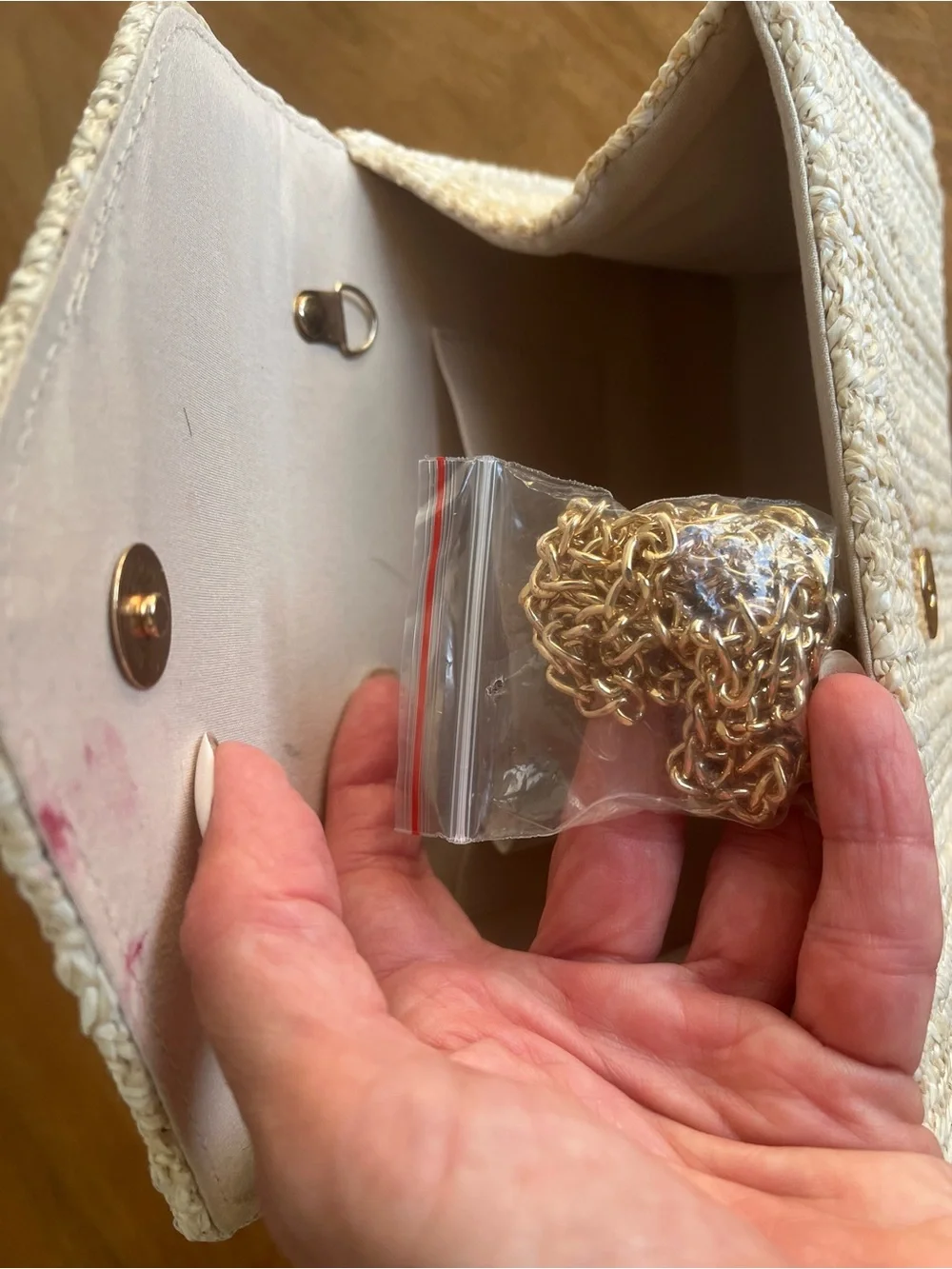 Beaded Handle Woven Straw Clutch in Natural
